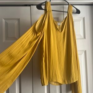 Silly yellow open should shirt